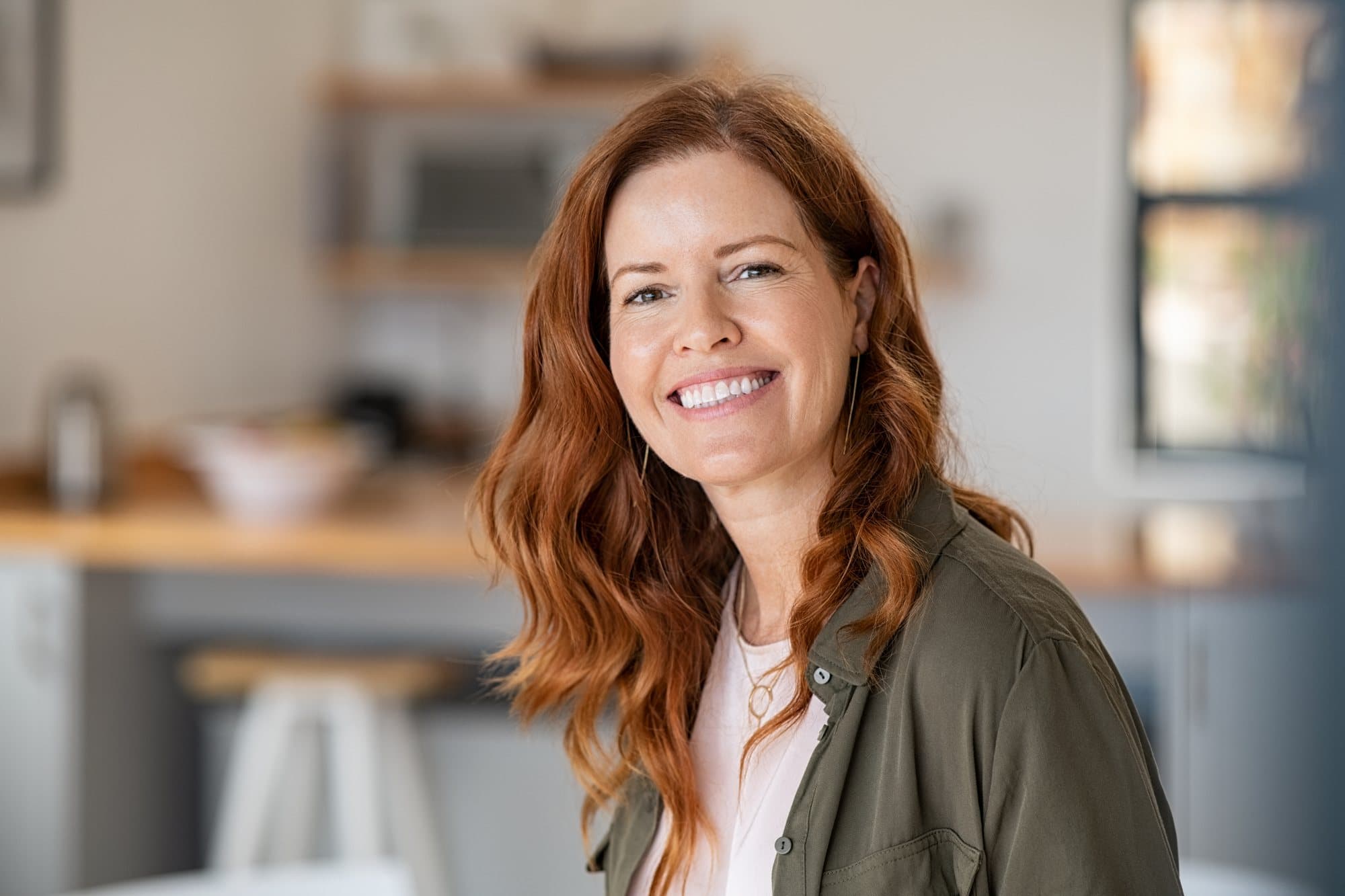 Smiling woman relaxing at home